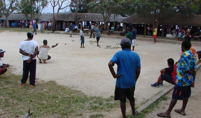 The Ni-Van men play the old French game of boule in a square beside the craft markets © BW Media